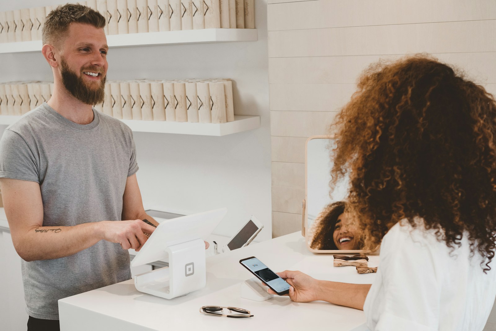 Customer using a phone to complete a service-related interaction